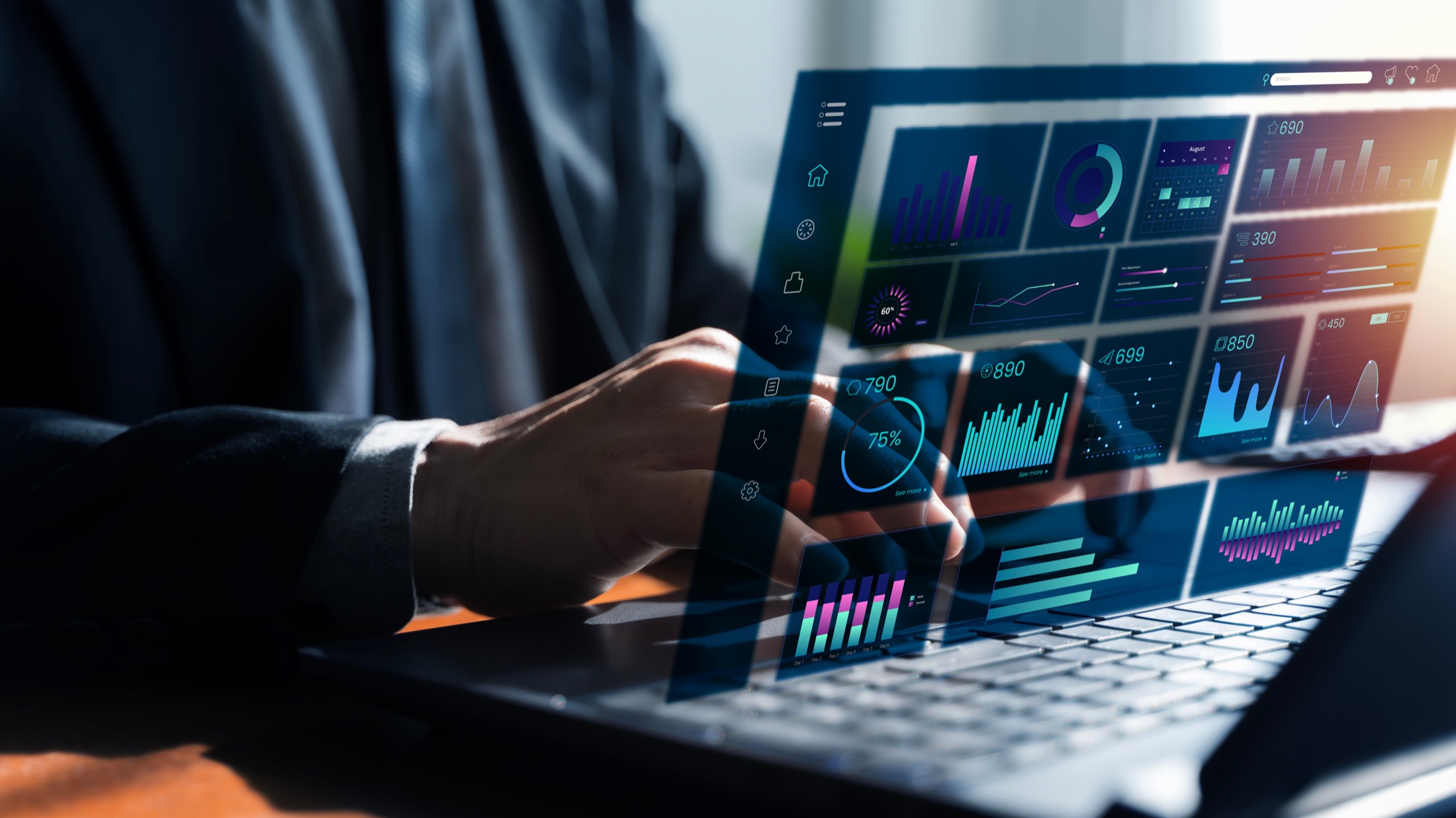 An analytics interface layered over a laptop